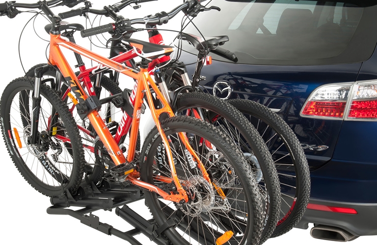Cycle stand for top car on rent
